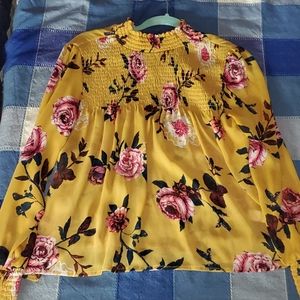 Yellow blouse with flowers